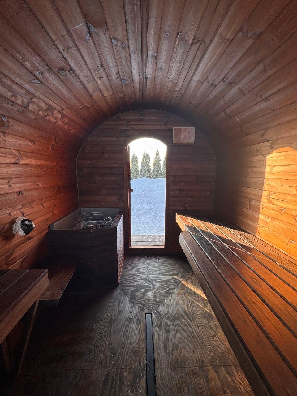 Sauna interior — oval ceiling and benches